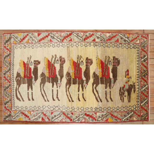 Mid 20th century Turkish Anatolian rug with a pictorial donkey design Size: 2'9'' x 4'9''.