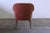 This elegant mid-century armchair embodies the refined craftsmanship and organic lines characteristic of Scandinavian...