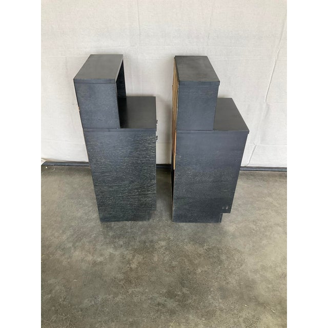 Pair mid century modern ebonized nightstands in good estate condition. There are some scratches and slight dings that...