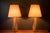 Pair of vintage sculptural ceramic pottery table lamps circa 1950's. This unique set features a a glossy tan finish with...