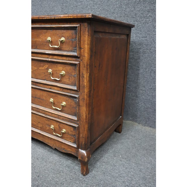 Country French eight drawer dresser by Guy Haddock, crafted in solid cherry with a warm natural finish. The dresser...