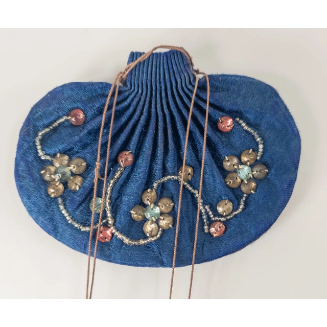 We are offering this 19th Century Chinese Qing Dynasty scent purse. This purple and blue silk purse has four tassels and...