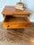 Crafted in the late 20th century, this handsome vintage rolling file cabinet combines traditional styling with everyday...