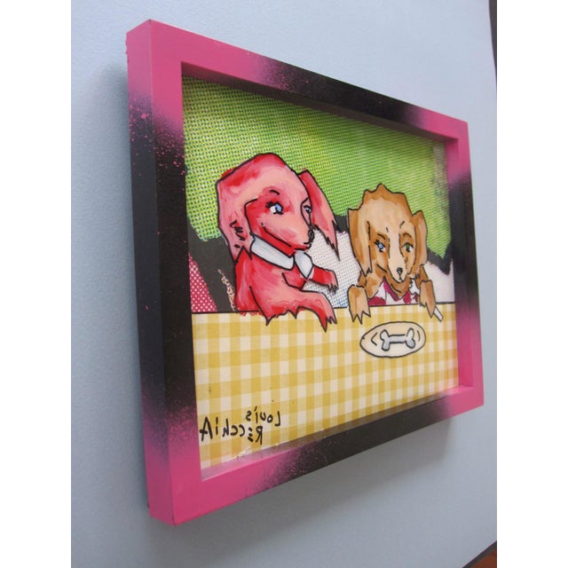 Puppy Love features two charming dogs seated at a table, each playfully engaged with their surroundings. The vibrant use...