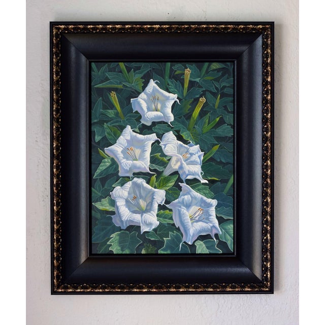 This artwork depicts a cluster of ethereal white moon flowers nestled among lush green foliage, creating a striking...