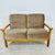 Dimensions: H 32.5” x W 51.5” x D 29.5” x SH 17” Vintage Scandinavian two-seater sofa upholstered in original brown/gold...