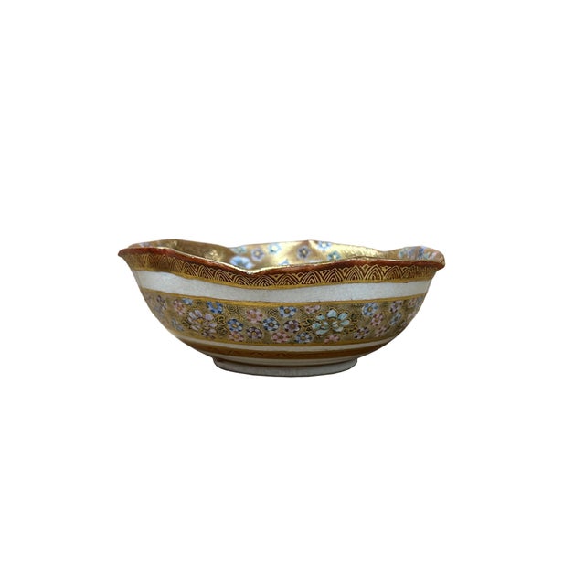 This exquisite Japanese Satsuma-style porcelain bowl is a masterclass in miniature artistry, featuring a lobed, flower-...