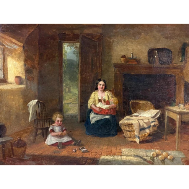 A beautifully preserved and richly detailed british victorian genre painting depicting an intimate scene of family life...