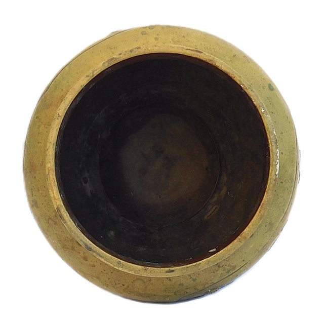 Japanese Brass Jardiniere or Planter Pot, late 19th / early 20th C., with raised design depicting traditional...