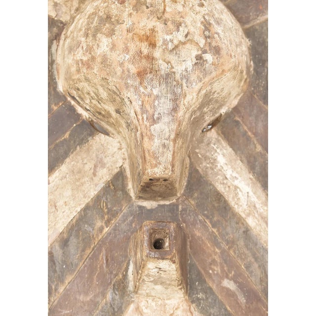 The Songye Kifwebe Mask was hand-carved by the Songye people in the southeastern part of the Democratic Republic of the...
