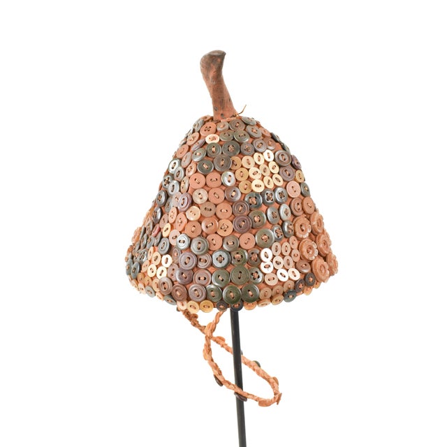 The Lega Bwami Society hat was crafted in the eastern regions of the Democratic Republic of Congo. This woven, palm fiber...