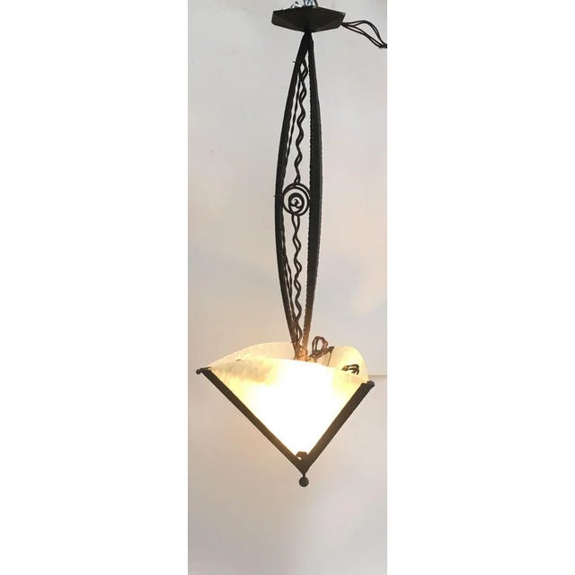 Fantastic French chandelier from the 1940s. Chandelier in good general condition, original glass, not cracked or chipped,...