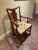 This is an elegant and comfortable antique wood chair that's well constructed. The brand is unknown.