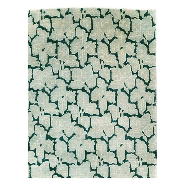 A vintage Turkish Art Deco style accent carpet handmade during the mid-20th century. Measures: 6' 0" x 8' 6".