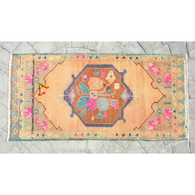 A vintage Turkish small yastik rug, beaver (strong orange) background color yastik rug perfect for entryway, bath or in...