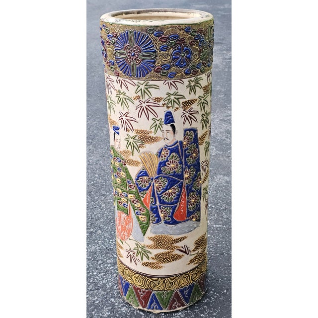 A 19th Century Meiji Satsuma Cylindrical umbrella Stand Vase with All-Over Samurai Decoration characterized of the Meiji...