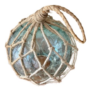 Mid 20th Century Authentic Hand Blown Blue Glass Fishing Float Buoy in Rope For Sale