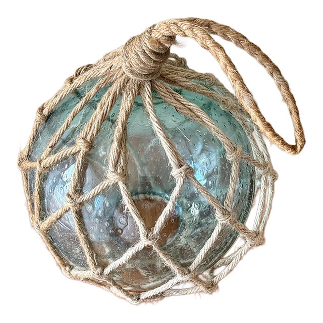 Mid 20th Century Authentic Hand Blown Blue Glass Fishing Float Buoy in Rope For Sale