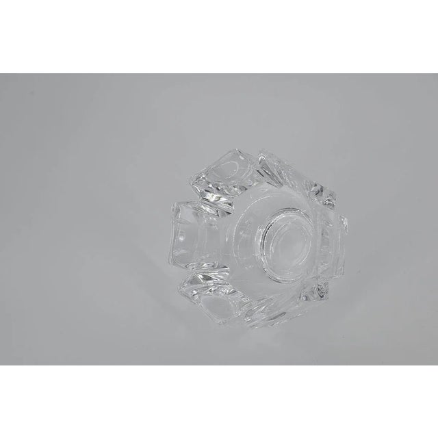This crystal corona bowl was designed by lars hellsten for the swedish glassworks orrefors in the 1970s. Made of high-...