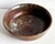 This substantial studio pottery bowl by John Gasper has a rich, tactile surface with variegated glaze effects in earthy...