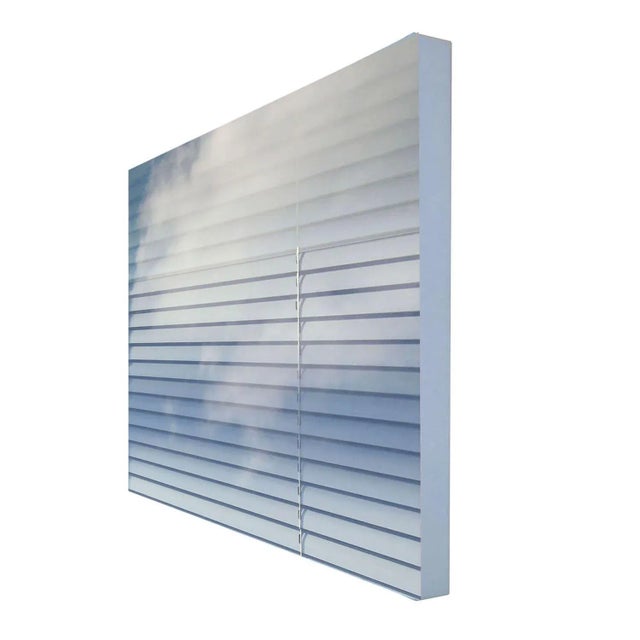 Isabelle Schneider's Throughline Series #2, 2024, ed. 1/5 is a work of photographic resin art, consists of sky reflections...