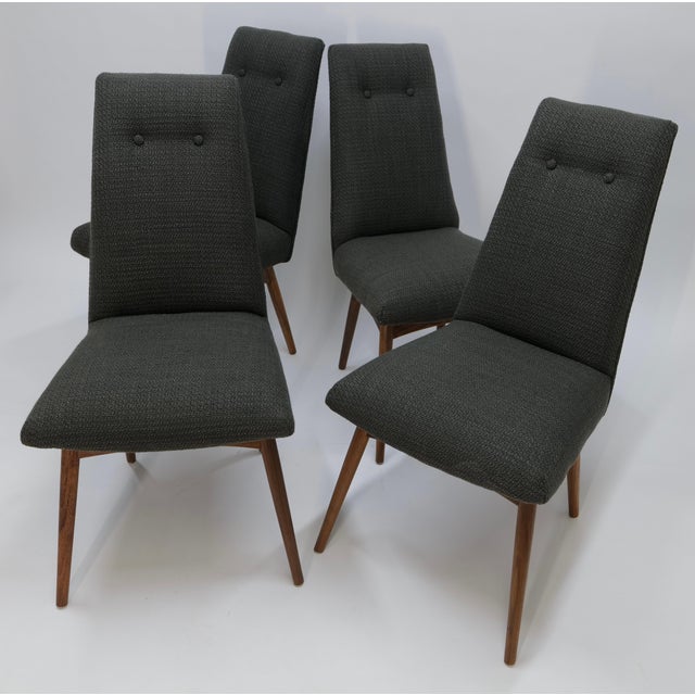 These dining chairs, designed by the renowned Adrian Pearsall, epitomize mid-century modern elegance. Each chair features...