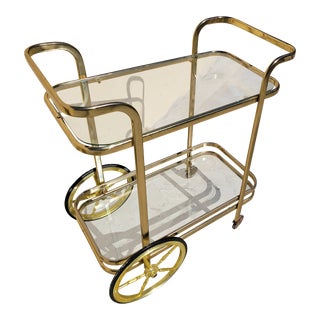 Mid Century Brass Hollywood Regency Brass Tone Tubular Bar Tea Cart For Sale