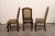 A French set of six Renaissance style carved wood and upholstered side chairs from the early 20th century. These antique...