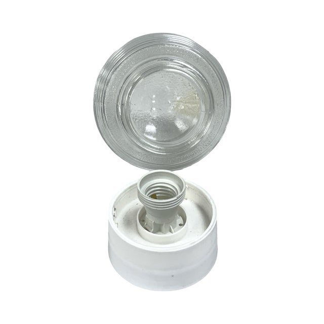 Wall sconce with an original glass shade manufactured in 1974, sourced from the Białystok Glassworks, paired with a new,...