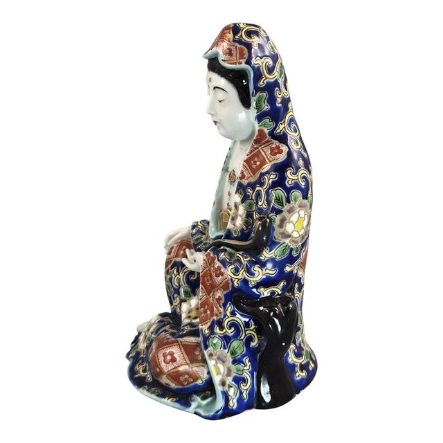 An unusual and highly decorative Japanese porcelain figure depicting Jigoku Dayū, the legendary Hell Courtesan, produced...