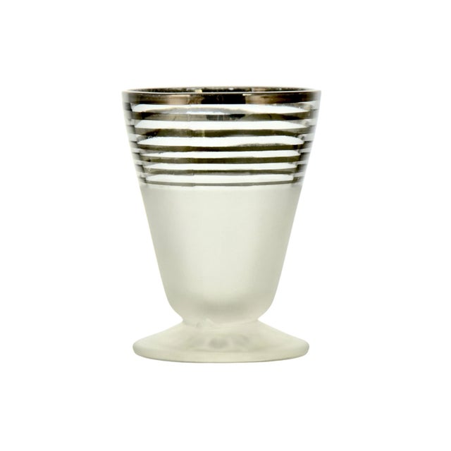 Set of eight barware silver band aperitif shot glasses with frosted pedestal foot. No maker's marks. Silver bands have...