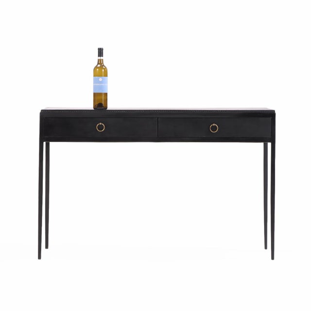 A striking contemporary writing desk inspired by the minimalist elegance of Jean-Michel Frank. The piece features a sleek...