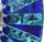 This handcrafted blue and green round mosaic wall mirror features a turquoise frame, adding a touch of uniqueness to any...
