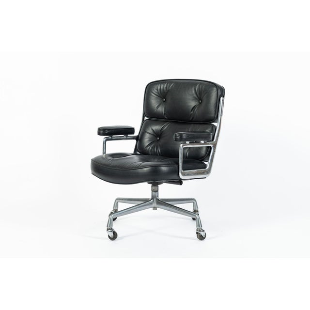 This vintage mid century modern black Model 3475 Eames Time Life Executive Lobby Chair designed by Charles & Ray Eames for...