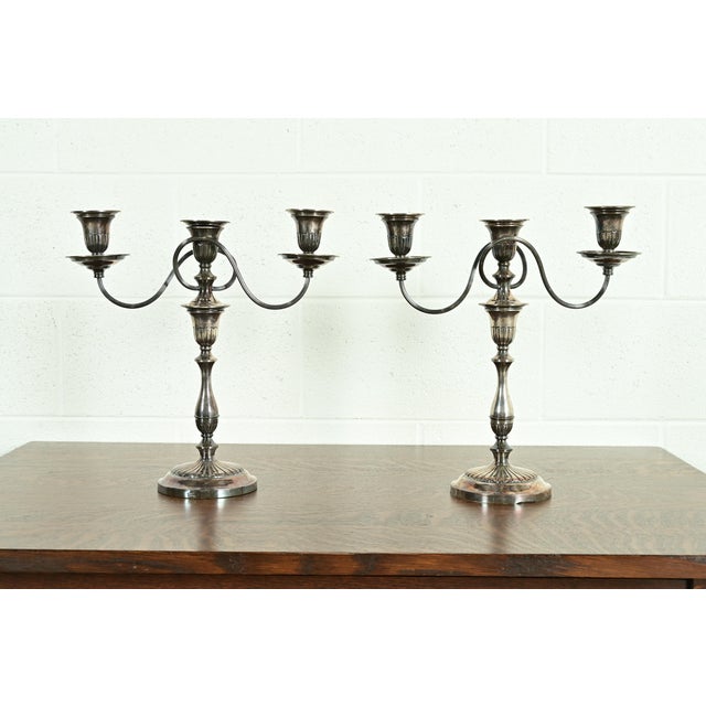 A gorgeous pair of antique Victorian or English Traditional silver plate three-light candelabras In the manner of Tiffany...