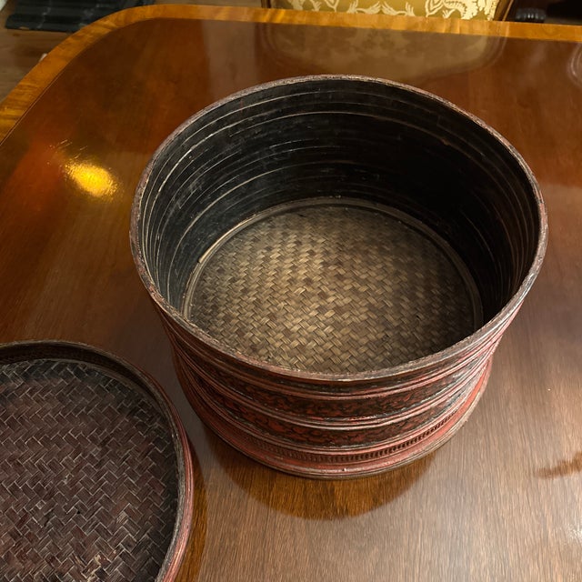 Red Lacquer Betel Tray Basket. Late 1800s. A lacquerware betel tray (khan mak) with a painted band of floral decoration....