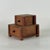 A sweet home accent piece in the form of miniature double level drawers cabinet. An art deco period creation that's great...