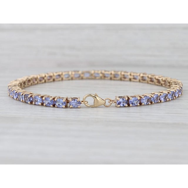 This elegant Tomas Rae tennis bracelet comes with a certificate of authenticity. Gemstone Information: - Natural...