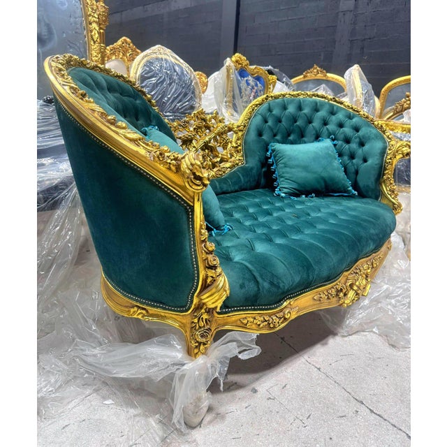 This vintage French Baroque style settee is a refined statement piece designed to bring drama, elegance, and classic...