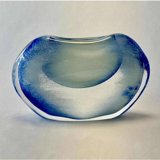Blown and hand-formed glass object "Winter" is part of the four seasons series. The inspiration is based on the harsh...