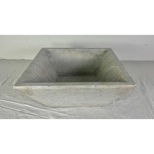 Mid 20th century square shaped solid stone Italian sink.