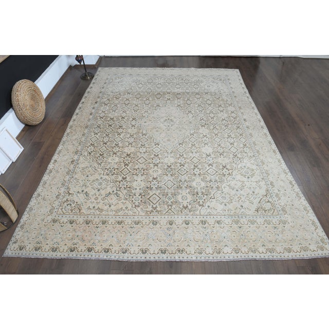 Vintage Persian Hand-Knotted rug is a semi- vintage oversize area rug.'70s Eastern region of Middle East's unique rug is...