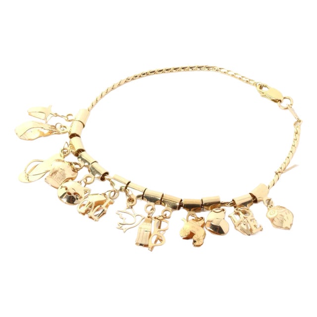 14k Yellow Gold 13 Dangling Multi-Charms Chain Bracelet For Sale