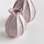 With a sculpted body and thicklyapplied reactive glaze, this pair of bud vases is a work of art. The handfinished details...
