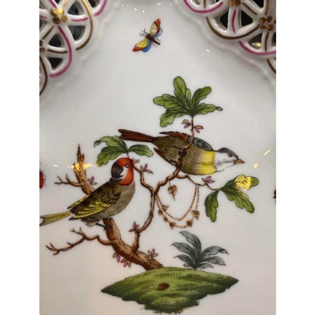 An exquisite piece of Hungarian porcelain artistry — a hand-painted Herend triangular tray in the beloved Rothschild Bird...