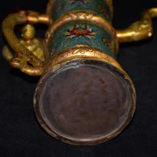 A striking and culturally rich vintage ewer, modeled after a traditional Tibetan butter tea pot (also known as a Monk's...