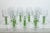 A set of 16 “Iris” crystal glass wine glasses manufactured by Rosenthal. Etched signature on bottom of each glass. The set...