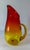 We are selling this great looking Mid-Century style Amberina red to yellow glass water pitcher attributed to Blenko Glass...
