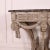 Pretty late 18th C French painted console table with a faux marble top. All carved wood. 1780. This piece is designed in...