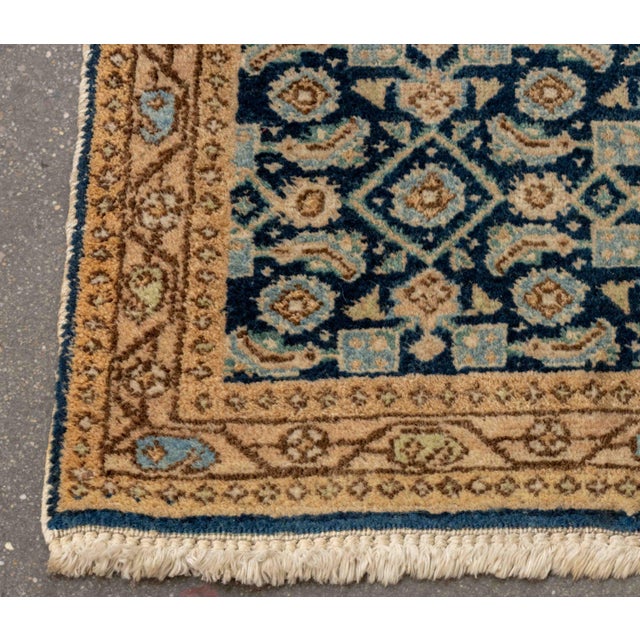 Persian Malayer Style Small Wool Rug, with floral design on a blue ground. 3' 3" L x 2' 3" W. Provenance: From an East...